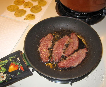 slice the corned beef and warm