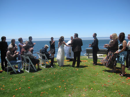 The wedding was lovely, on a grassy bluff at Shell Beach.