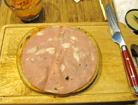 Add a slice of mortadella (or use your cold cut of choice).