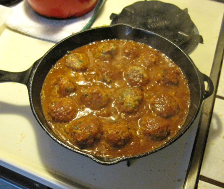 meatballs cook in tomato sauce