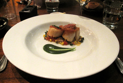 carmelized scallops over a corn sauce with pureed arugula