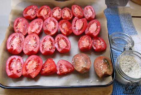 tomatoes sliced in half and salted to let sit for an hour...
