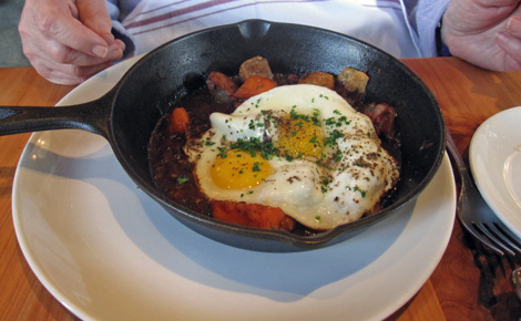 Carol’s Sweet Potato Hash arrived first. Careful, hot skillet.